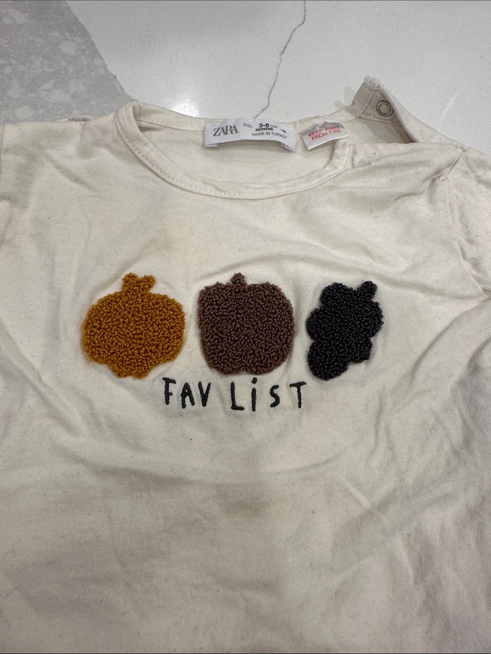 Zara Cream Tee with Mustard, Brown and Black Fruit Appliqués